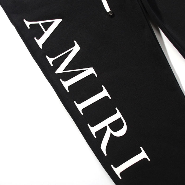 AMIRI Zoltar Tapered Logo-Print Cotton-Jersey Sweatpants