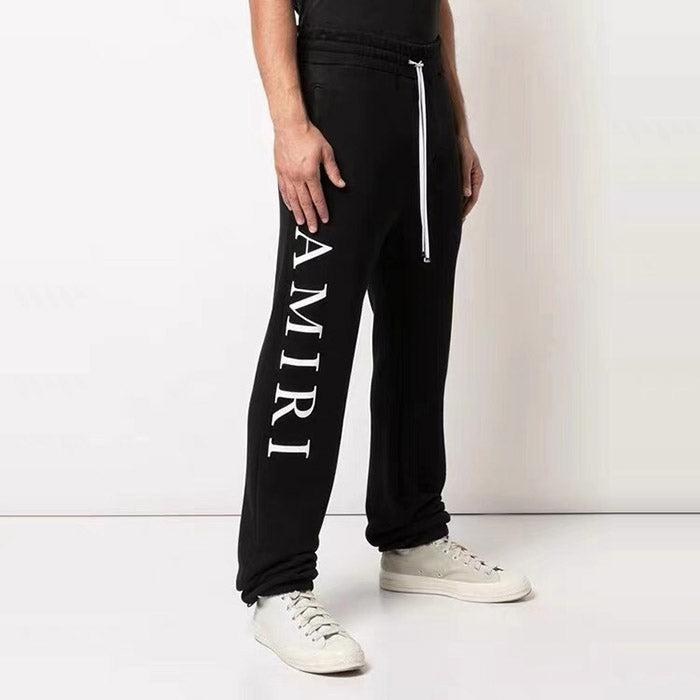AMIRI Zoltar Tapered Logo-Print Cotton-Jersey Sweatpants